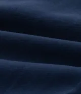 Short pollera de sastreria color azul marino, con pliegues frontales, cierre tradicional y gancho en la cintura. Posee forro interior de malla.