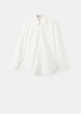 Camisa oversize blanca de mezcla de algodón y lyocell, con cuello camisero, manga larga, puños abotonados y detalle de perlas aplicadas en toda la prenda.