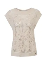 Remera sin mangas Kaimana de RKF, color beige, confeccionada en tejido de punto con diseño calado de patrones florales y cuello redondo.