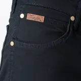 Pantalón de jean negro Wrangler modelo Texas Slim, de corte ajustado.