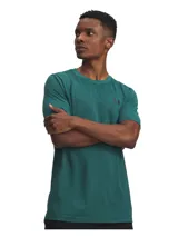 Remera deportiva Under Armour Vanish Seamless SS de manga corta y cuello redondo, color verde, con diseño sin costuras y paneles de malla para mayor transpirabilidad.