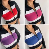 Top manga larga con cierre frontal y diseño tricolor con franjas horizontales en negro, blanco y rojo, fucsia, violeta o azul.