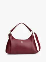 Cartera tipo hobo de Tommy Hilfiger en color bordó, confeccionada en poliuretano con acabado liso. Cuenta con compartimento principal con cierre de cremallera, bolsillo interior con cierre, asa superior y correa ajustable y extraíble. Presenta el logo metálico de la marca en relieve en la parte delantera y detalles en herrajes dorados.