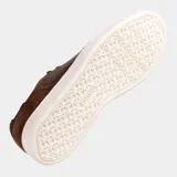 Championes Joma modelo Campus, color marrón oscuro con detalles en gamuza marrón más clara. Tienen suela blanca y cordones marrones. En el lateral se lee la palabra "Joma" y en el talón la palabra "Campus".