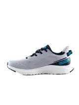 Championes de running Umbro modelo Dax Pro, color azul marino con detalles en naranja brillante, suela blanca y capellada de malla transpirable.