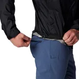 Campera cortaviento Columbia con tecnología impermeable y transpirable, capucha integrada, cierre frontal, ventilación en axilas y puños ajustables.