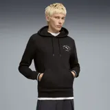 Canguro Puma de felpa color negro, con capucha con cordón ajustable, bolsillo frontal tipo canguro y detalles de líneas blancas en los puños. Presenta un pequeño estampado circular en el pecho con el logo de la marca y la inscripción "Puma Athletics".