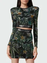 Top corto de manga larga con hombreras y estampado floral de hojas y flores en tonos verdes, amarillos y blancos. Banda elástica con logo de la marca en el bajo.