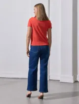 Buzo tejido en hilado fino color naranja, marca Ninety.