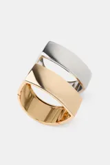 Pack de dos pulseras metálicas articuladas, una dorada y una plateada, con cierre de imán.