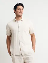 Bermuda verde militar de lino.