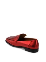 Mocasines de cuero color cobre con acabado metálico y punta cuadrada.