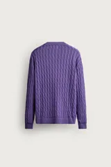 Cárdigan regular fit de punto tejido en hilatura de algodón, colaboración Fruit of the Loom x Zara. Presenta cuello en V, manga larga, cierre frontal con botones oscuros y efecto lavado. Cuenta con acabados en rib y parche de la marca en el bajo.