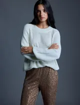 Pantalón largo de lentejuelas negras, marca Ninety, con pretina ancha elastizada, bolsillos laterales y forro a tono.