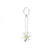Llavero de metal plateado con forma de margarita y cristal amarillo facetado en el centro. Incluye aro y cadena de eslabones.