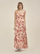 Musculosa con estampado abstracto en blanco y negro, escote en V y breteles finos.