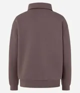 Saco cerrado de algodón con felpa, color bordó, con cuello polo, cierre frontal con botones, manga larga y puños y bajo ajustados.
