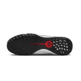 Championes de fútbol Nike Tiempo Legend 10 Pro para césped sintético, color blanco con detalles en rojo y negro. Presentan el logo de la marca en el lateral y suela con tapones diseñados para tracción en superficies artificiales.