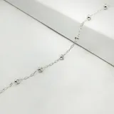 Pulsera de plata 925 con cadena forcé y bolitas facetadas. Largo de 19cm.