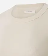 Blusa básica de manga larga Marfinno, color beige, confeccionada en tejido acanalado con cuello redondo y diseño ajustado.