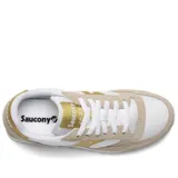 Championes Saucony Jazz Original de dama, color blanco con detalles en dorado y beige.