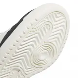 Championes Adidas Forum 2000 de estilo urbano, con diseño en bloques de color negro y blanco. Presentan las icónicas tres bandas laterales en blanco, cordones jaspeados y suela de goma blanca con el logo de la marca grabado.