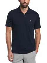 Polo azul marino de tejido interlock suave y durable, con cuello acanalado, tapeta con botones y logo Sticker Pete bordado al pecho.