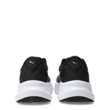 Championes de running Puma Max Stride Lite para mujer, color negro con detalles dorados y suela gruesa blanca.