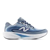 Championes de running New Balance modelo Ellipse, color azul con detalles en blanco y gris. Confeccionados en malla técnica ligera y transpirable, cuentan con entresuela de amortiguación Fresh Foam X y suela de goma.
