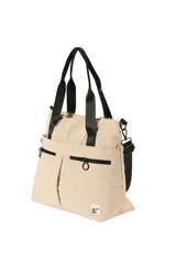 Bolso negro tipo tote de poliamida con doble asa de hombro, bolsillos frontales con cierre y tiradores circulares.