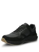 Championes urbanos de cuero negro con detalles en descarne, diseño con suela Spinal de alta amortiguación y base de goma para mayor tracción.