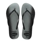 Sandalias Havaianas Slim Gloss negras con estampado de estrellas blancas.
