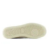 Championes New Balance 480 de cuero color blanco con detalles en verde en el talón y logo "N" en los laterales.