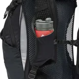 Mochila técnica Columbia de 30 litros, color negro, diseñada para senderismo y actividades al aire libre. Cuenta con respaldo de malla transpirable, estructura de acero elástico, sistema de compresión lateral, bolsillos laterales para botellas, compatibilidad con sistema de hidratación y bolsillos organizadores.