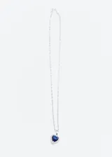 Cadena de plata 925 con dije de corazón azul rodeado de pequeñas circonitas.
