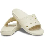 Chancletas Crocs modelo Classic Slide de color blanco, fabricadas en material Croslite™ con perforaciones en la tira superior para personalizar con Jibbitz™.