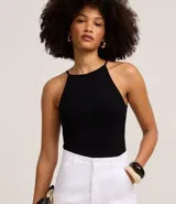 Body negro sin mangas, confeccionado en Rib, con escote recto y textura canelado. Ajustado al cuerpo.