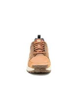 Sneaker Caterpillar modelo Grapple Leather para hombre, fabricado en cuero marrón con detalles en tonos tostados y azul oscuro, con suela dentada y entresuela de EVA.