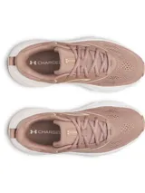 Championes de running Under Armour modelo W Rogue 6, color rosado con entresuela blanca. Cuentan con parte superior de malla transpirable, superposiciones de soporte y amortiguación Charged+.