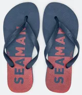 Ojotas azules con base roja y estampa de la marca Seaman.