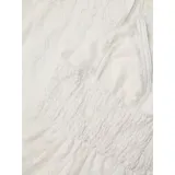 Vestido largo de encaje calado color blanco, con diseño de falda irregular más corta adelante. Presenta escote en V con cordones decorativos y borlas, tirantes finos y detalle de cintura marcada.