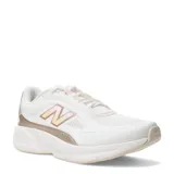 Championes New Balance CTLYST de mujer, color blanco con detalles en dorado y toques rosados en los pasadores. Presentan capellada de malla transpirable, entresuela gruesa de espuma DynaSoft y suela con refuerzos de goma.