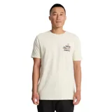 Remera color crema con estampado en el pecho de un auto con tablas de surf y el texto "Roark".