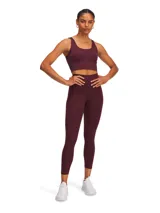 Calza deportiva de tiro alto en color bordó, confeccionada en tejido de punto elástico de alto rendimiento. Cuenta con bolsillos laterales y diseño ergonómico para mayor sujeción y comodidad durante el entrenamiento.