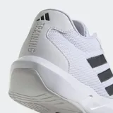 Championes de training Adidas Amplimove Trainer, color blanco con las tres franjas características en negro. Presentan una parte superior de malla sin costuras con refuerzos de TPU y mediasuela esculpida de EVA.
