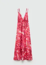Vestido maxi de algodón con diseño estampado en tonos fucsia y naranja. Presenta escote en pico, tirantes finos dobles y espalda descubierta con cierre de lazo. Diseño evasé sin mangas.