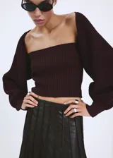 Cardigan de punto color ciruela, estilo bolero de manga larga abullonada, con diseño crop y entallado.