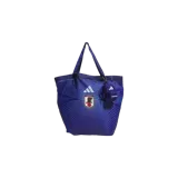 Bolso tipo tote bag Adidas color azul con diseño gráfico de líneas curvas, escudo de la selección de Japón y logo de la marca en el frente. Incluye un mini morral decorativo colgante.