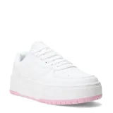 Championes urbanos Umbro modelo Milo High, de diseño tipo plataforma en color blanco con detalles en rosado en la suela. Presentan el logo de la marca grabado en el lateral y perforaciones en la puntera para mayor ventilación.