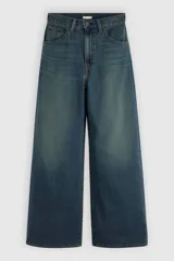 Jean de corte baggy, tiro medio y pierna ancha, color azul con efecto desgastado. Confeccionado en 100% algodón sin elasticidad.